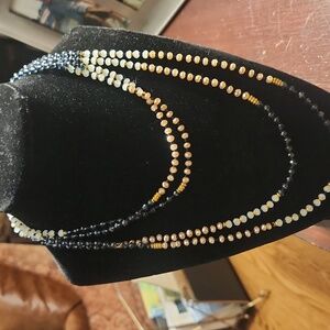 NWOT JKNY HSN ( 2) Strands Gold ,Black And White Beaded Necklaces....